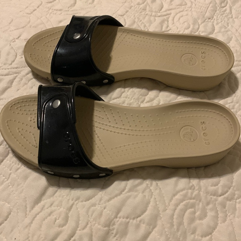 Crocs shiny black slide sandals. Size 8.5